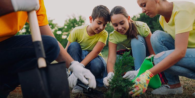 Image Better Communities - family planting vegetable